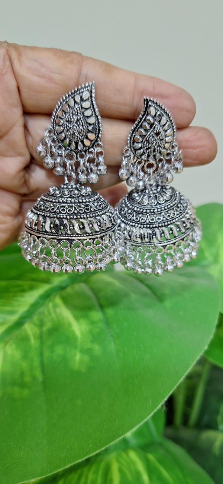 Intricate oxidized silver teardrop jhumkas